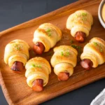 Perfectly Crispy Pigs in a Blanket with Crescent Rolls First Image